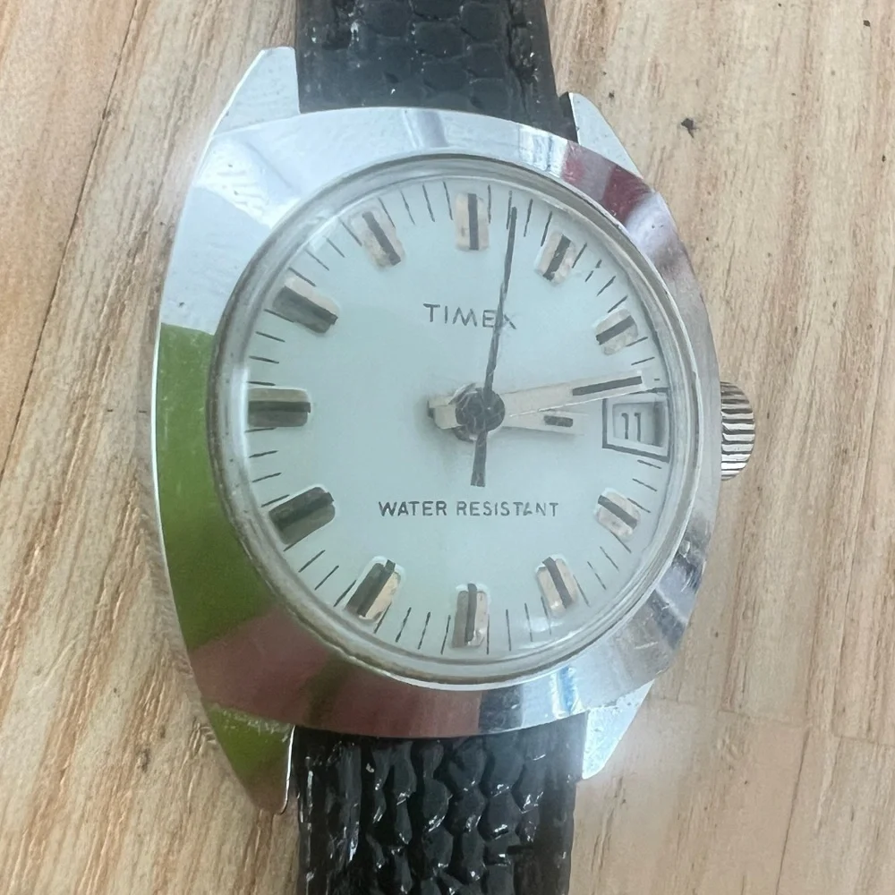 Vintage Timex ladies silver tone black leather mechanical Winding dress watch